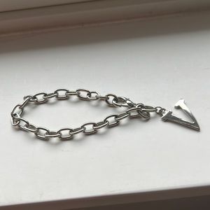 Silver tone V charm bracelet